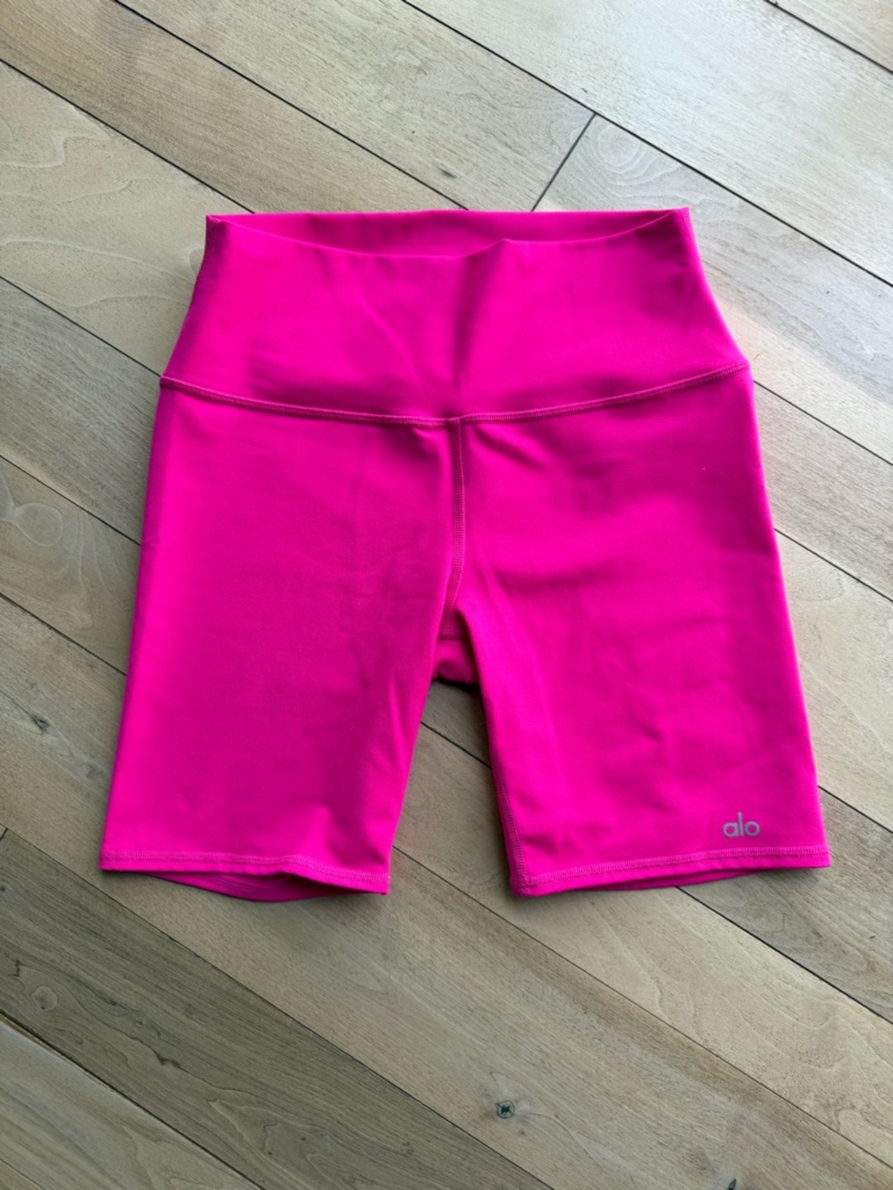 ALO Yoga High-Rise Bike Shorts in Bright Hot Pink 7”
